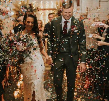 Andrew Redmayne and Caitlin walked down the aisle in 2018.
